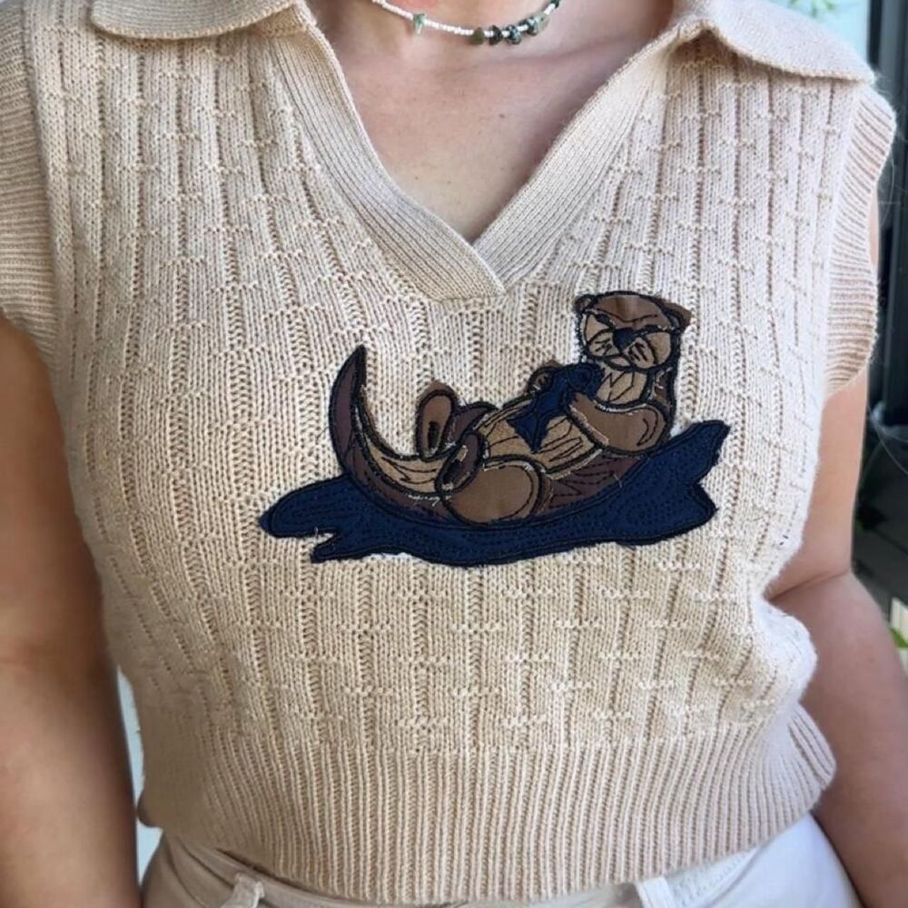 upcycled otter with fish patchwork embroidered tan collared knit sweater vest
